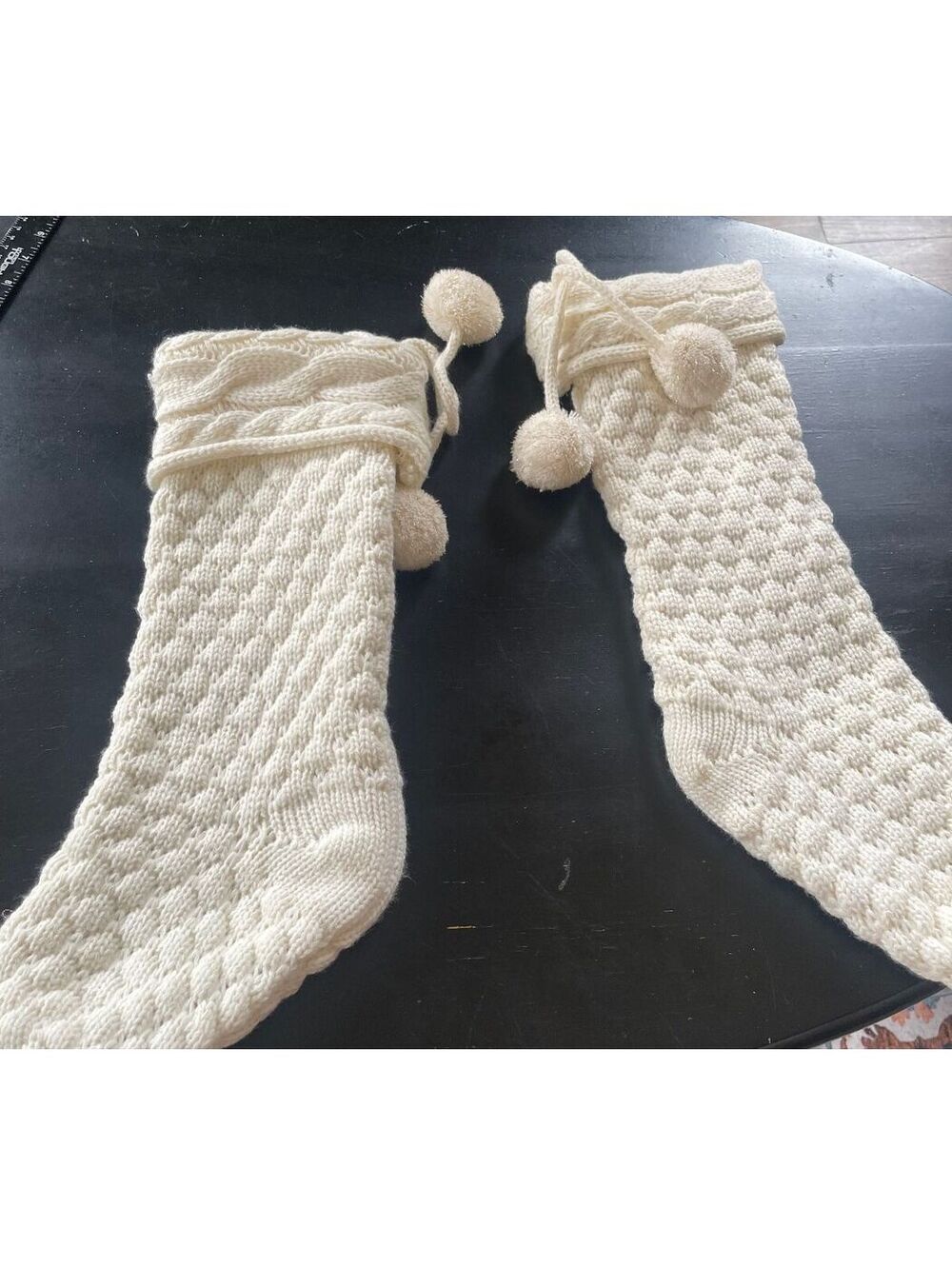 Pair of Ivory Cable Knit Christmas Stockings with Pom Pom Accents